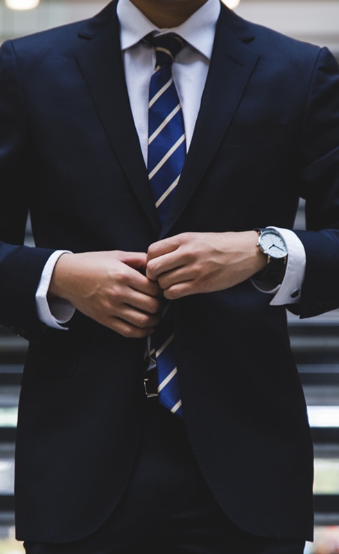 Businessman standing with arms crossed
